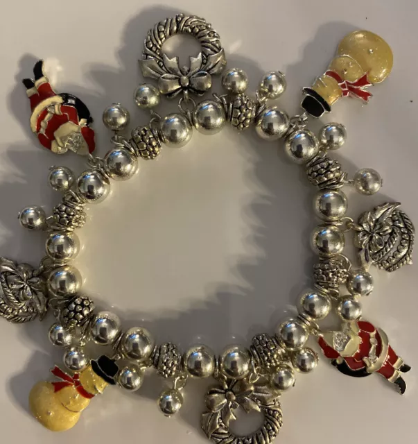 AVON Silver Tone Beaded Enameled Christmas Charms Stretch Bracelet Snowman/Santa