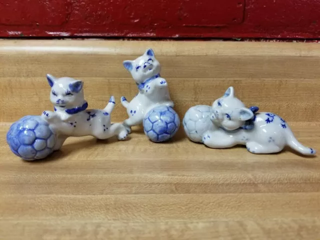 Ceramic White and Blue Cats playing with Balls Made in China