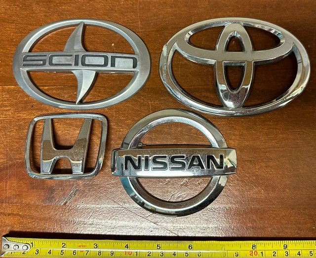 LOT OF 4 Car Emblems Japanese makes Scion Honda Toyota Nissan badges