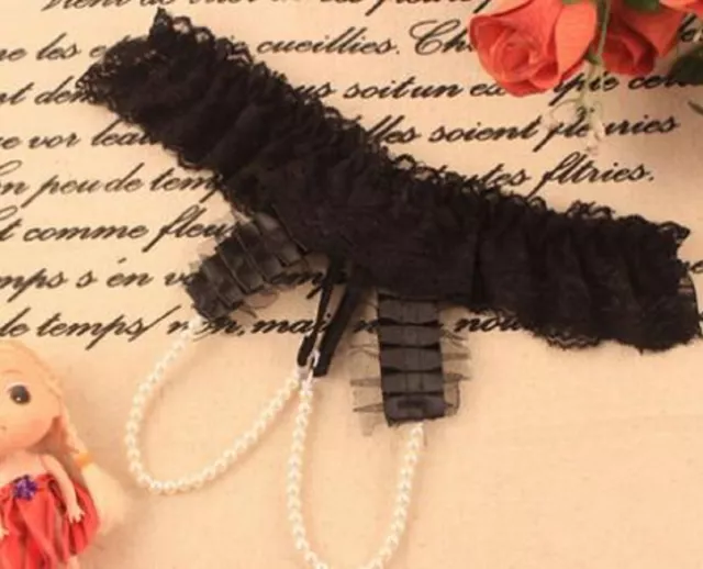 Idee Cadeau Lingerie Sexy: Micro String - Dentelle Noire - Ficelles Perles