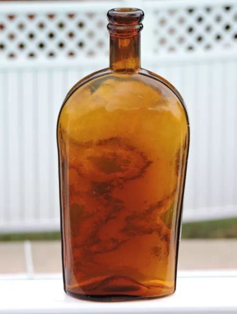 30 oz. HONEY AMBER STRAP SIDED WHISKEY FLASK, POST BOTTOM MOLD BLOWN BOTTLE