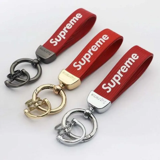 RED-GOLD  SUPREME PENDANT WITH KEY HOLDER, AND FLAT SCREWDRIVER. Keychain