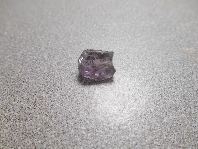 Spinel. faceting rough.  medium lavender  color. 5.7 cts. Tanzania... clean.