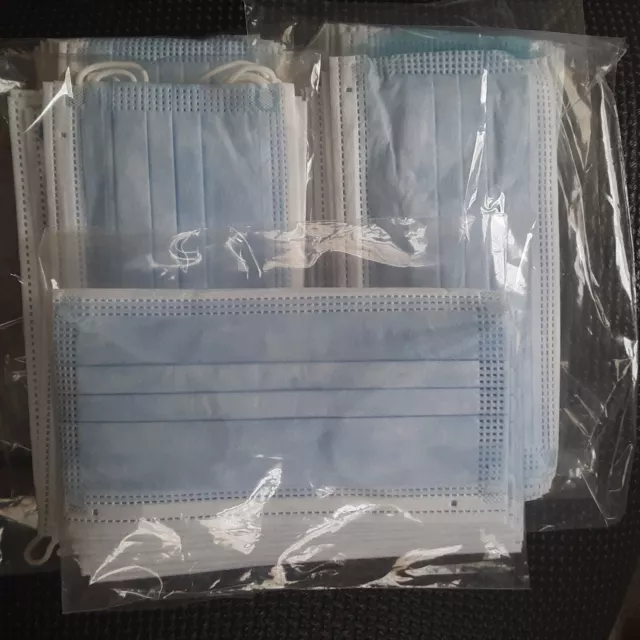 50 Pcs Face Mask + PLUS 5 Reusable Masks (4) Black, (1) Red/White