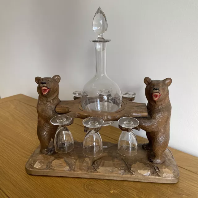 A Superb Black Forest Bear Decanter And Glass Set