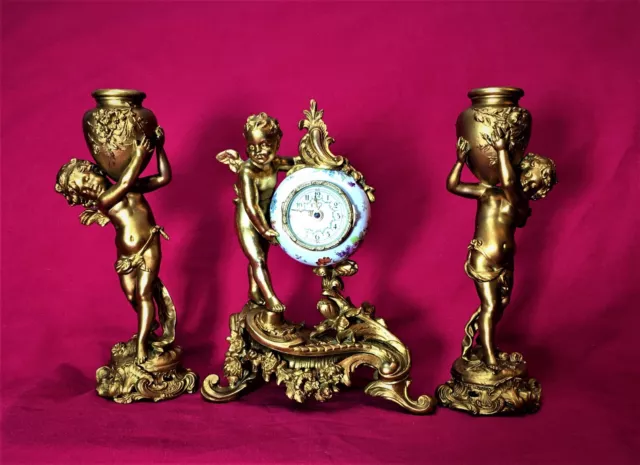 Antique French Auguste Moreau Cherubs gilded mantel clock Garniture set