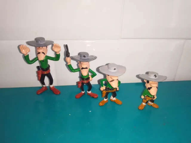 2109263 Lot 4 Figurines en plastique ancien Lucky luke JIM les frères daltons