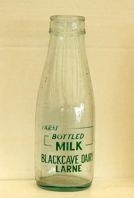 nice old Black Cave of Larne N.I. milk bottle : dairy pint