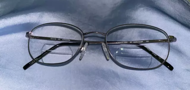 Monturas de gafas de metal ovalado Marchon Flexon 600 Gunmetal 52-18-140