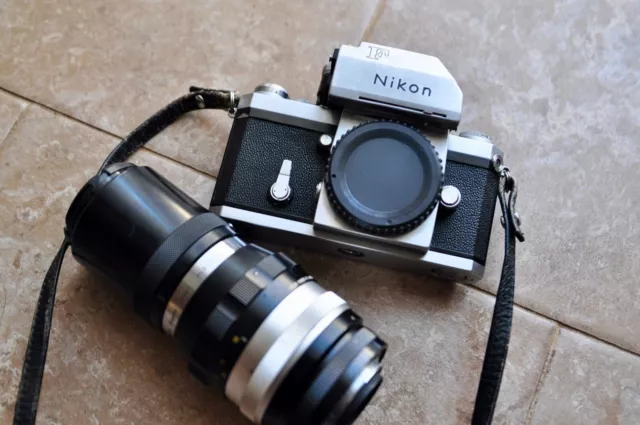 Nikon F camera body with a Nikkor lens