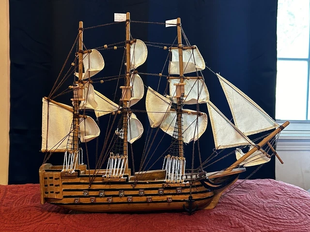 antique wooden boat model, missing stand, Tanish, not that big, fun to blow up 
