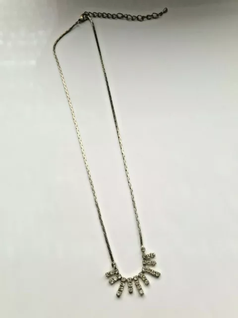 Vintage silver tone necklace with herringbone chain and clear rhinestone drops