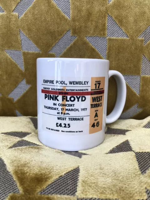 PINK FLOYD -A Ceramic 11oz Mug . Featuring a Wembley Empire pool 1977 ticket