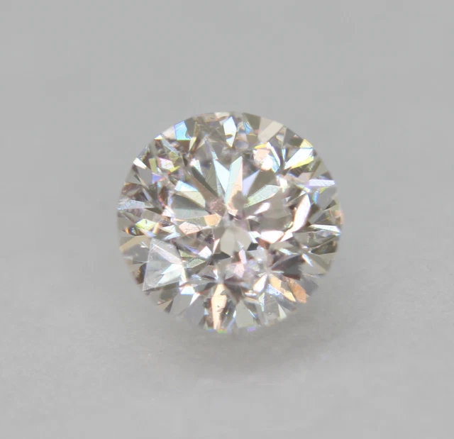 Certified 0.57 Carat D VS2 Round Brilliant Enhanced Natural Diamond 5.2mm 3VG
