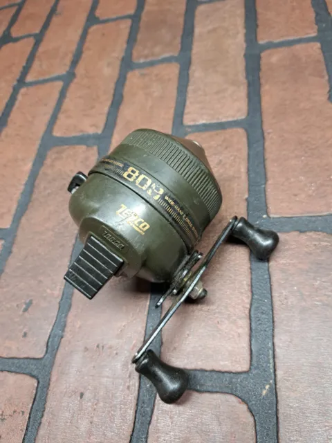 VINTAGE MADE IN USA ZEBCO 808 FISHING REEL Nice Condition $21.50