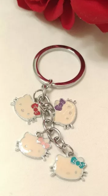 Key chain hello kitty four charms silver tone cartoons childhood kitten head