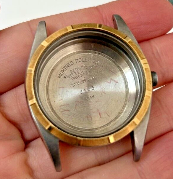 A 1956 6694 Rolex steel and gold wristwatch case with military issue inscription A 1956 6694 Rolex steel and gold wristwatch case with military issue inscription