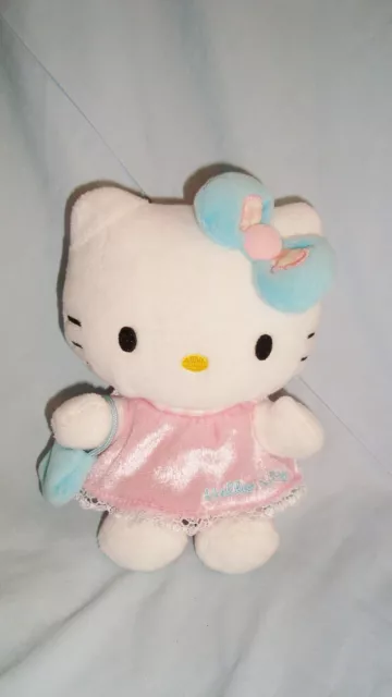 Peluche Hello Kitty Fleur Salopette Rose Sanrio Jemini - Coeur de Doudou