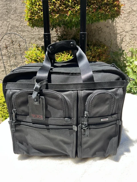 TUMI Alpha Rolling Wheel-a-way Carry-on Ballistic overnight suitcase 26103dh 17”