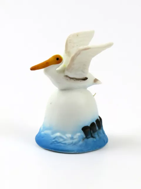 Vintage Ceramic Pelican Shaped Small Porcelain Bell with Beach Pier Scene