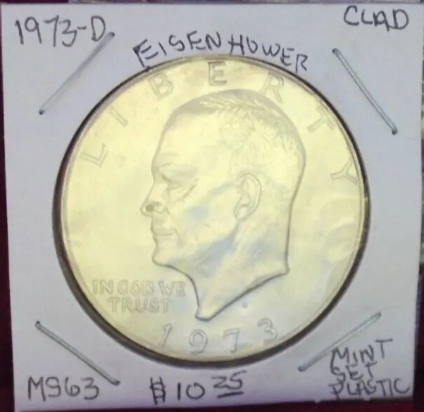 1973 Denver Eisenhower Dollar Still In Cello Plastic And In Mint State Condition