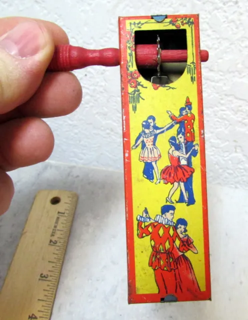 vintage 1920s noisemaker tin litho toy, dancers, great graphics & colors