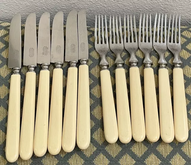 VINTAGE STAINLESS UNIVERSAL RESISTAIN FORK AND KNIFE SET MADE IN USA WOOD  BOX