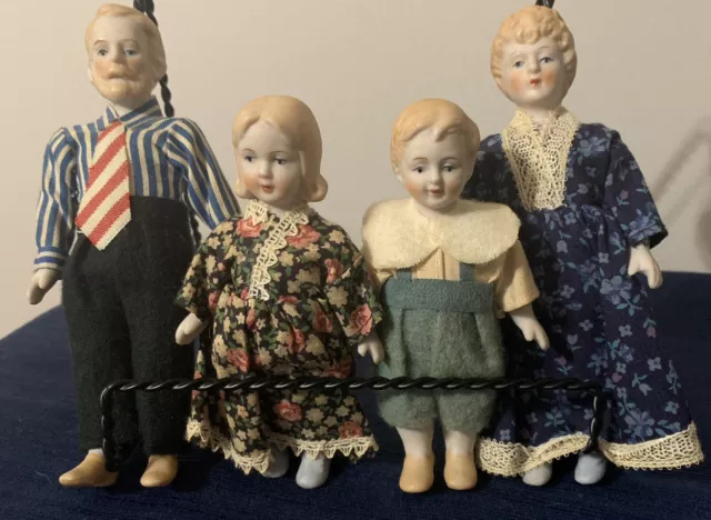 CACO Doll Family Antique Bisque, Jointed Porcelain of 4 in Orig. Clothes