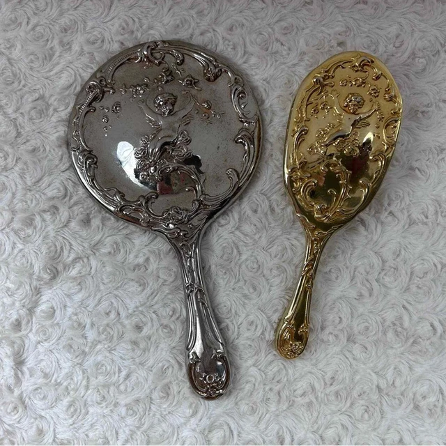 Vintage Victorian cherub vanity matching set Comb & Mirror very heavy!