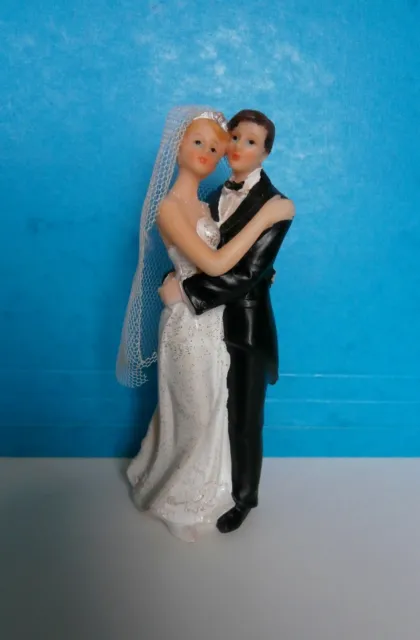 Figurine couple de mariés pour gâteau en résine en très bon état