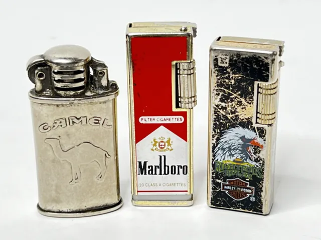 Lot of 3 Vintage Refillable Cigarette Lighters Harley Davidson Marlboro Camel