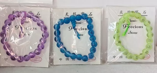 "ZF31"--pretty bundle of 3 new in packet green, blue, lilac beaded bracelets