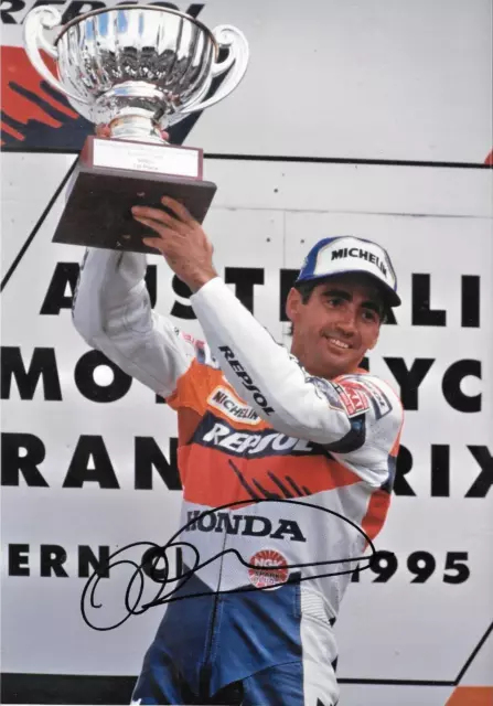 Mick Doohan SIGNED 12x8  Victory Podium Portrait  Eastern Creek  Australia  1995