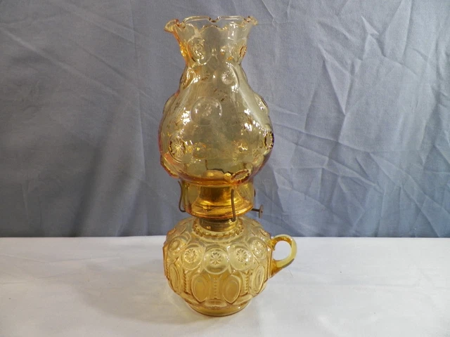 L.E. Smith Amber Glass Moon & Stars Oil Lamp w/ Finger Loop L.E. Smith Amber Glass Moon & Stars Oil Lamp w/ Finger Loop
