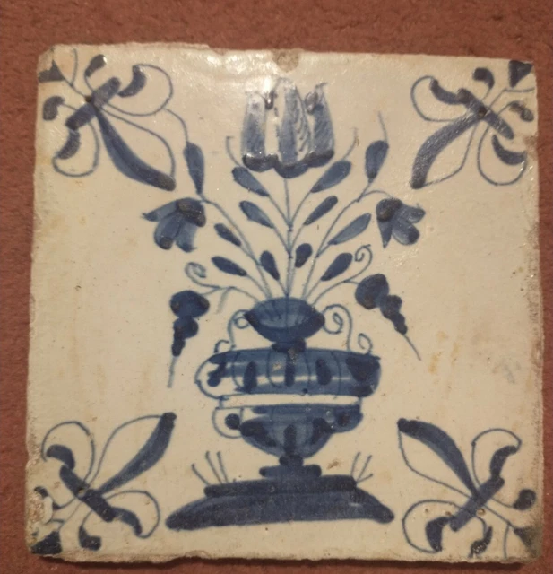 Charming 17th Century Delft ceramic tile with flowers in a vase  13cm x 13cm