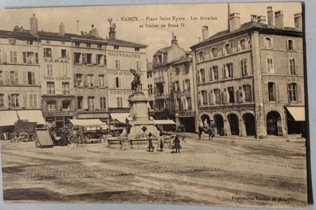 (DPT 54) NANCY - Place Saint-Epvre - Les arcades et statue de René II