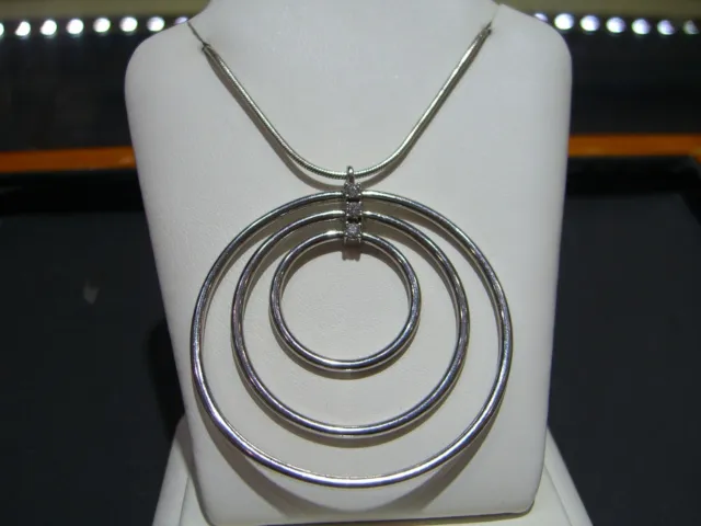 Movado 18 Karat White Gold Diamond And Sterling Silver Pendant Necklace Circle!!