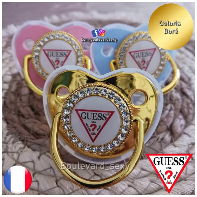 👶🏆 Tétine/Sucette Doré en silicone bébé tendance Baby Guess Pacifier 0-3 ans