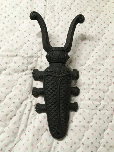 Tire-bottes Scarabée en fonte brune - Moinat SA - Antiquités décoration