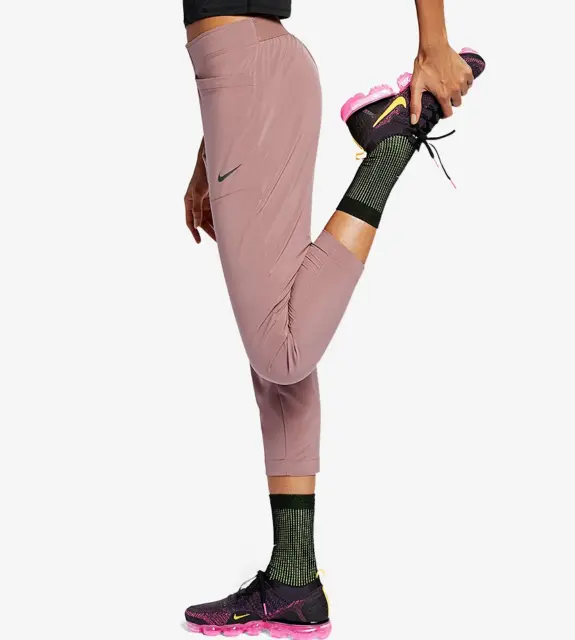 https://www.picclickimg.com/Dh4AAOSwh55eZqhp/Nike-Swift-Running-Division-7-8-Slim-Fit-Trousers.webp