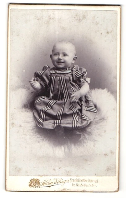 Fotografie Atelier Ellinger, Frankfurt-Oberried, Portrait lächelndes Kleinkind