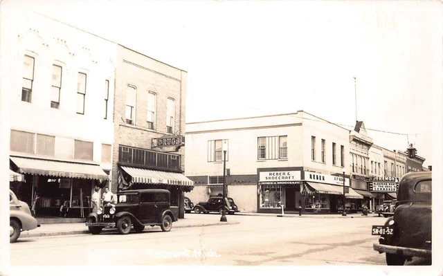 RPPC FREEMONT MICHIGAN REBER & SHOECRAFT CAR REAL PHOTO POSTCARD (c. 1940s)