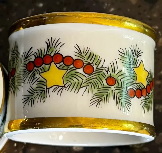 Fitz and Floyd napkin rings St Nicholas pattern pine garland yellow stars red 2