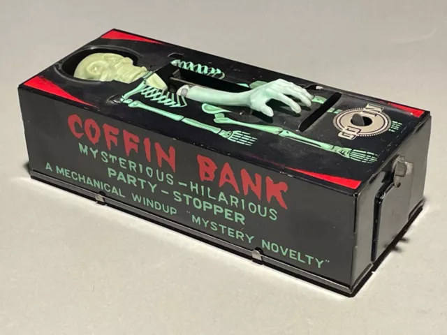 COFFIN BANK - salvadanaio gioco in latta vintage con meccanismo a molla