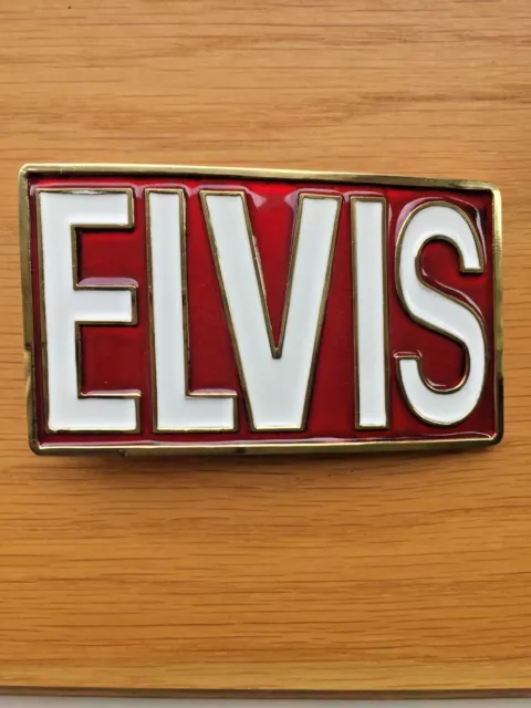 Elvis belt buckle the king of rock and roll.