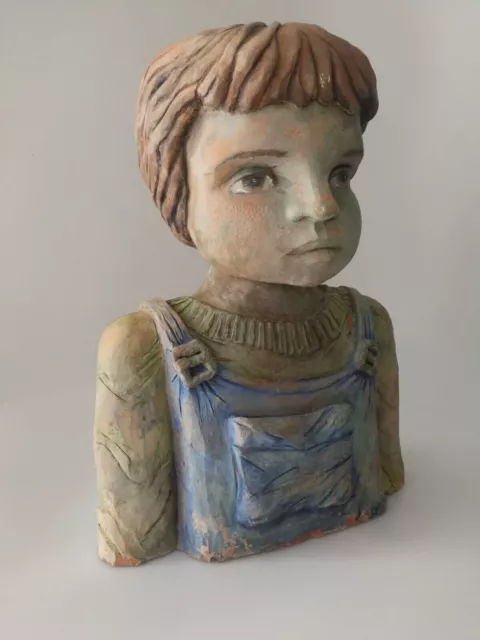 Terracotta sculpture of a child bust Signed and dated 1996