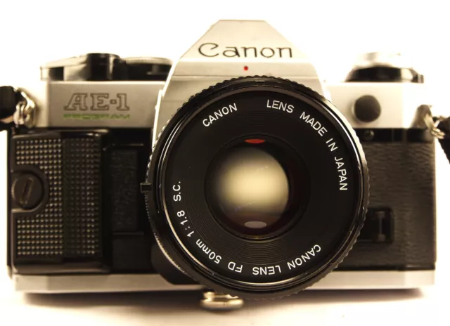 Canon AE-1 PROGRAM sylver-Black + objectif CANON LENS FD 50mm 1:1.8 S.C.