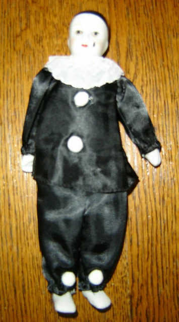Sad clown 2025 porcelain doll
