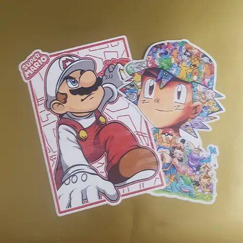 stickers de Mario et de Sacha tout en puissance, planche de 11 sur 17 cm