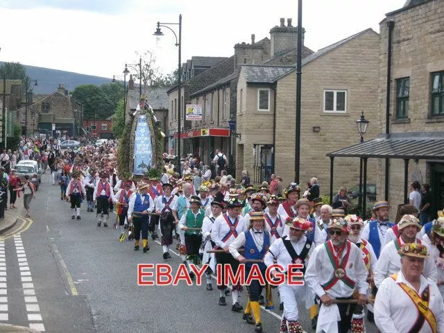 Photo  Saddleworth Rushcart Festival Morris Men Pull The Rushcart Along The High